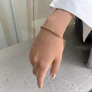 Braided design gold plated bracelet